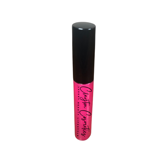 Dark pink vegan luxury lip gloss. Moisturizing and hydrating to protect the lips. 